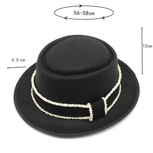 Detail of wool pork pie hat showing bead-trimmed band and specific size measurements