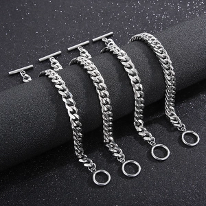 Sleek silver stainless steel Cuban link bracelets with OT buckle on black display stand