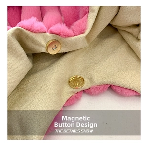 Close-up of pink faux fur tote bag showing the golden magnetic snap closure and lining