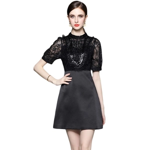 Elegant black short-sleeve dress with lace bodice, sequins, and structured A-line skirt