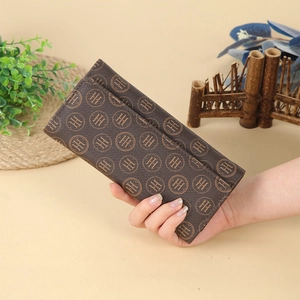 Deep brown women's long wallet featuring golden logo patterns and a leather texture