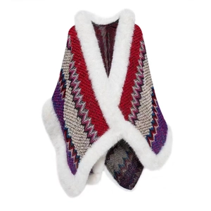 Close-up of ethnic knit shawl featuring wave patterns and white faux fur trim collar