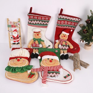 Christmas stocking gift bags with gingerbread man decor for festive holiday tree decoration