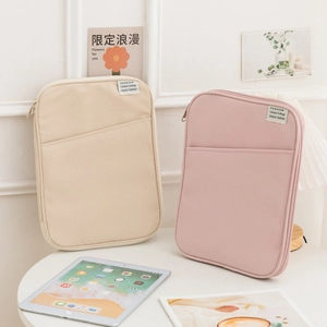 Shockproof 11-inch iPad sleeve in beige and pink canvas with convenient front pocket