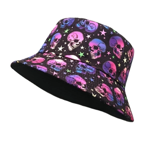 Double-sided bucket hat featuring colorful gradient skull and star patterns on black fabric