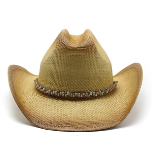 Classic straw cowboy hat with bohemian decorative band on a clean white background