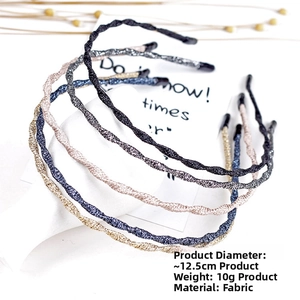 Detailed view of five slim glitter wavy headbands in diverse colors with fabric wrap finish