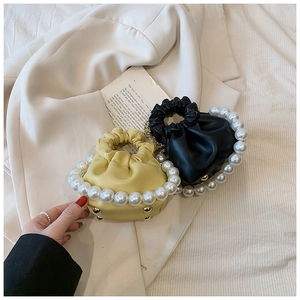Mini pearl handle drawstring bucket bags in yellow and black PU leather for girls