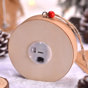 Wooden LED Christmas tree ornament with battery pack view and warm natural wood finish