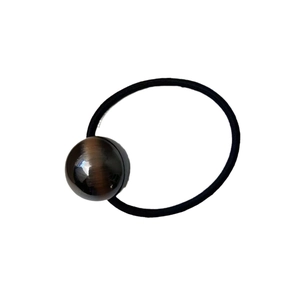 Minimalist black elastic hair tie with a polished brown tiger eye stone bead ball