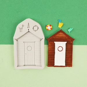 Detail of beach house silicone mold with wood texture for fondant and DIY resin crafts