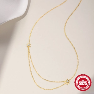 Double-layered S925 sterling silver star necklace with gold finish and tiny diamonds