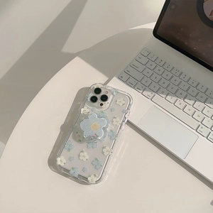 Detail of floral iPhone Pro case with blue flowers and matching flower-shaped grip stand