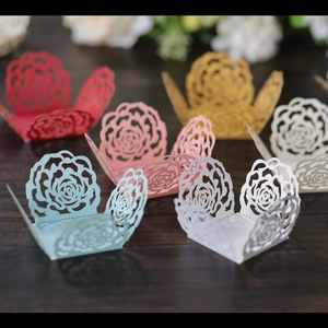 Detailed laser-cut rose hollow cupcake wrappers in multiple colors for wedding party decor