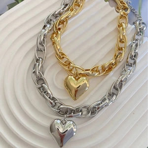 Gold and silver chunky double-weave chain necklaces with polished heart pendants