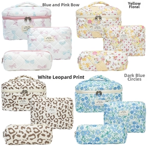 Quilted cotton floral toiletry bag set with dual metal zippers and diamond stitching detail
