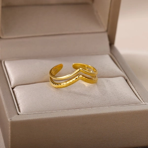Detail of 18k gold plated double-layer V-shape open ring with hammer texture finish
