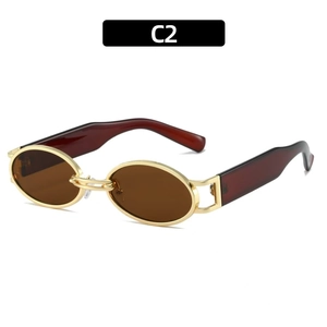 Vintage oval sunglasses with brown lenses and golden metal frame on white background