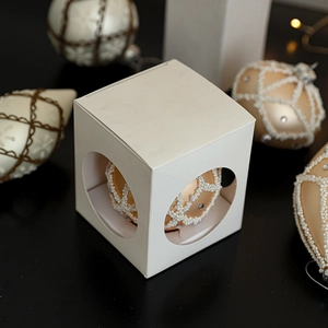 White Christmas ball ornament with pearl grid and rhinestones in a luxury gift box