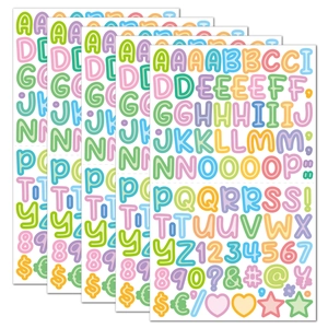 Macro detail of 0.5-inch colorful bubble letter stickers for scrapbooking and DIY crafts