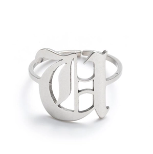 Detailed view of silver Gothic letter D adjustable open ring with polished metal finish