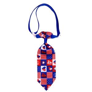 Detail view of July 4th pet tie with adjustable blue strap and white plastic buckle