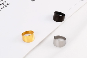 Minimalist wide titanium steel rings in gold, silver, and black with brushed texture finish