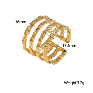 Detail view of gold wave ring showing width of 16mm and inner diameter of 17.4mm