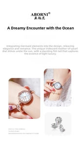 Detail of ABORNI mermaid quartz watch with mother of pearl dial and crystal accents