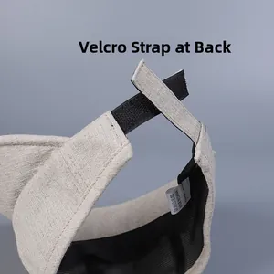 Détail de la sangle Velcro réglable et de la doublure en maille respirante sur le pare-soleil