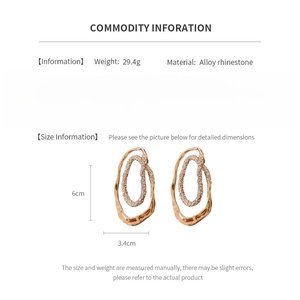 Size information and material detail of the 6cm gold plated rhinestone earrings
