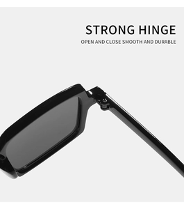 Macro detail of reinforced metal hinges on vintage square sunglasses for smooth opening