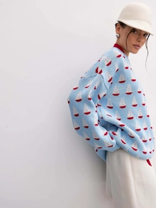 Pull en maille bleu ciel avec motif jacquard voilier et coupe ample décontractée