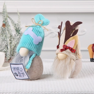 Christmas dog-themed gnomes set with blue knitted hat and antler design decorations
