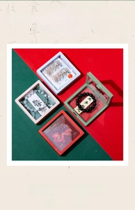 Detailed view of four colorful PE film floating display boxes for jewelry storage