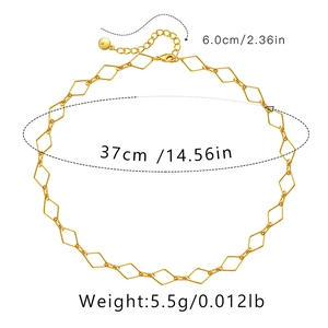 Detail view of the 18K gold-plated diamond-shaped hollow chain links and lobster clasp