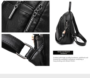 Detail of silver metal zipper and hardware on black lychee grain leather backpack
