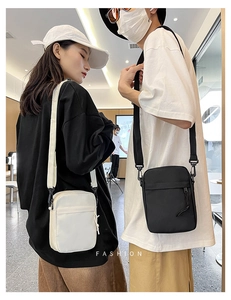 Detail of trendy crossbody bags in black and white shown on models for size scale