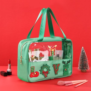 Detail of Christmas chenille embroidery LOVE letters on green PVC wash bag