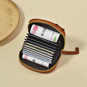 Brown leather cartoon cat card holder with multi-slot accordion design and zipper closure