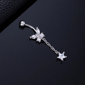 Detail showing silver butterfly navel ring with zircon flower and dangling star charm