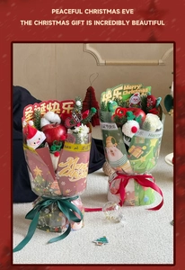 Close-up of Christmas bouquets with red apples and pine branches on white carpet