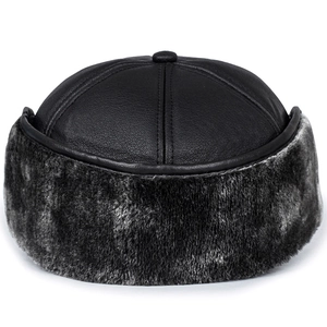 Winter faux leather baseball cap for men featuring warm ear flaps and thick grey fur lining