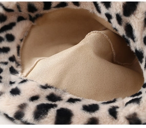 Close-up of plush leopard bucket hat showing soft faux fur texture and neat stitching