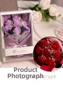 Detail view of purple and red soap rose bouquets in elegant windowed gift boxes