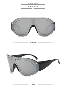 Macro view of C5 black frame and silver wrap-around lenses on sports sunglasses