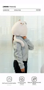 Detail of plush white Persian cat pillow showing soft long fur and removable tail feature