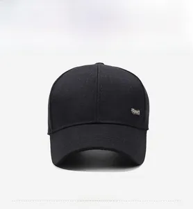 Front view of black baseball cap featuring a polished silver Sport metal emblem