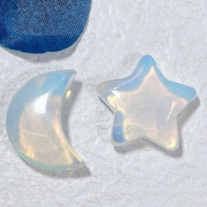 Macro shot of iridescent opal star and moon crystals for DIY craft and home decor