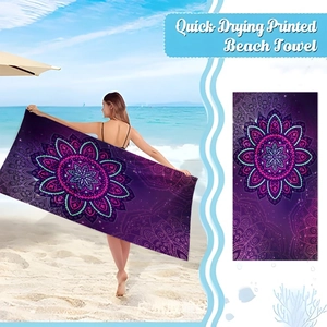 Detail of purple mandala beach towel with quick-dry microfiber fabric and 3D lotus print